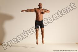 Underwear Gymnastic poses Man Black Muscular Bald Dancing Dynamic poses Academic